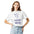 Woman wearing a White star cluster shirt printed with seven navy stars gathering around an empty conductor's music stand above the words CLUSTER MUSTER