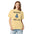 Woman wearing the Butter Name Dropping orion constellation shirt, front close-up with the pocket, name tags, stars and lettering fully visible