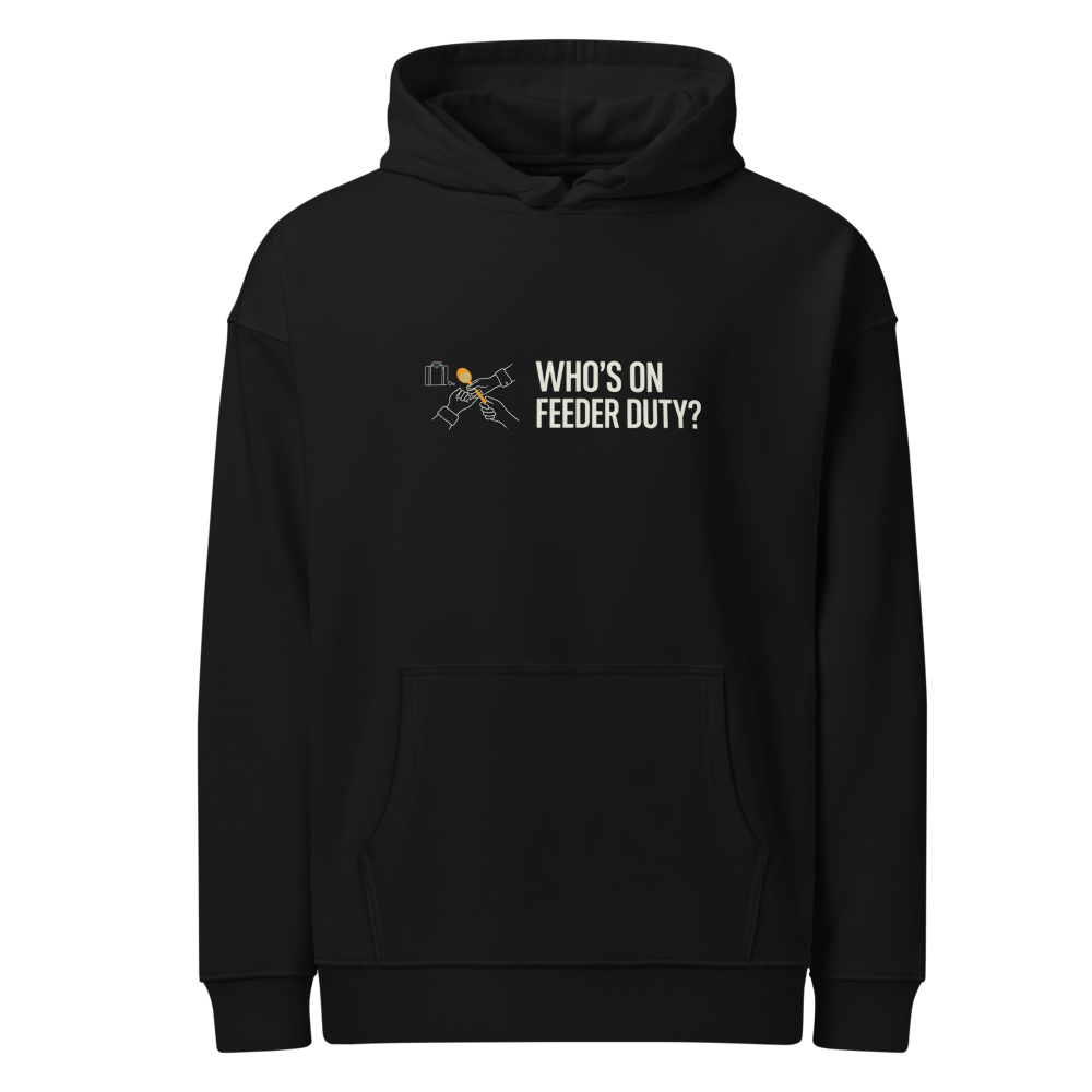 Bird Lover Hoodie in Black, front view: two hands passing a seed scoop beside WHO'S ON FEEDER DUTY?