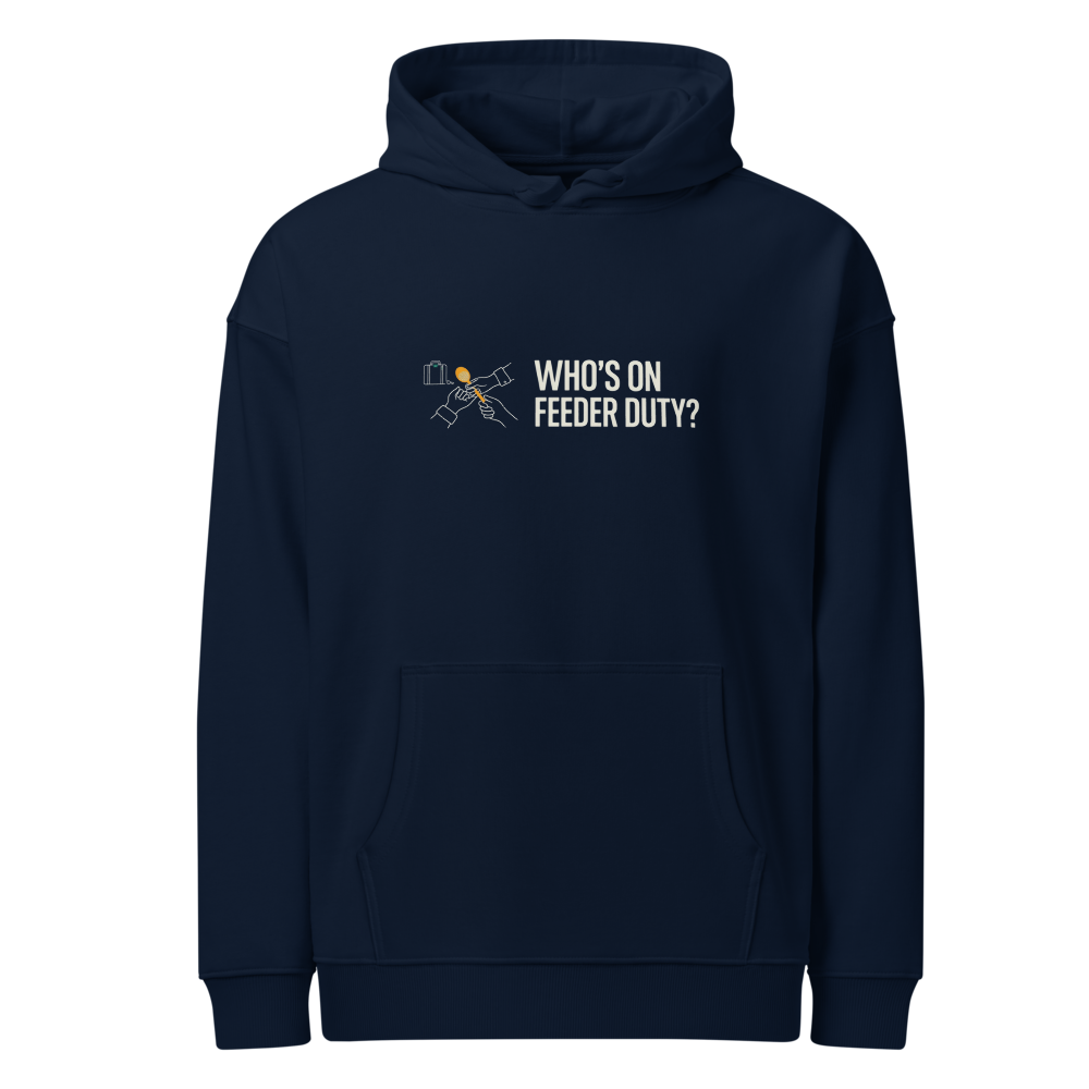 Bird Lover Hoodie in French Navy, front view: two hands passing a seed scoop beside WHO'S ON FEEDER DUTY?