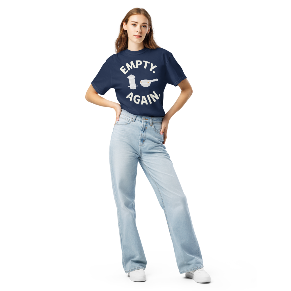 Woman wearing the True Navy bird shirt for women with EMPTY. AGAIN. curved around a feeder and scoop