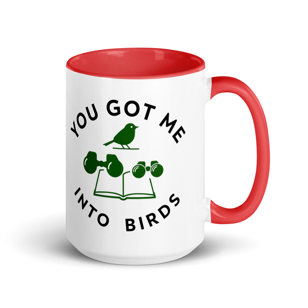 Bird watcher gift mug with red inside, 15 oz, handle on the right: YOU GOT ME INTO BIRDS around a bird, binoculars and a field guide