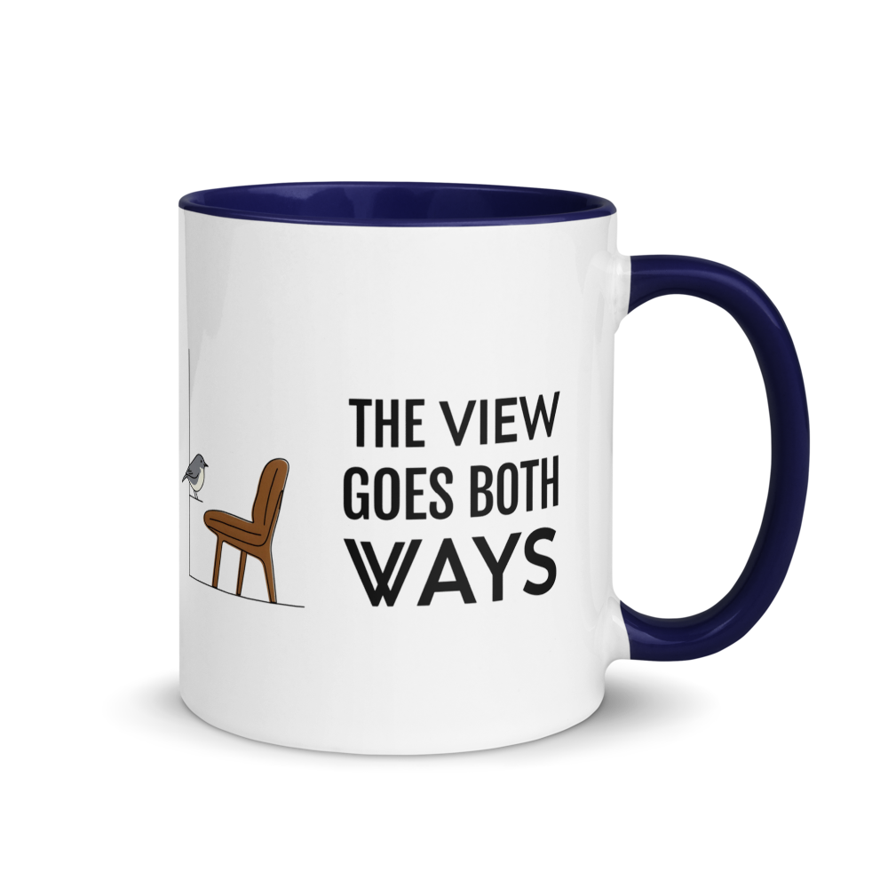 Bird watching mug with dark blue inside, 11 oz, handle on the right: THE VIEW GOES BOTH WAYS beside a bird on the sill and an empty chair