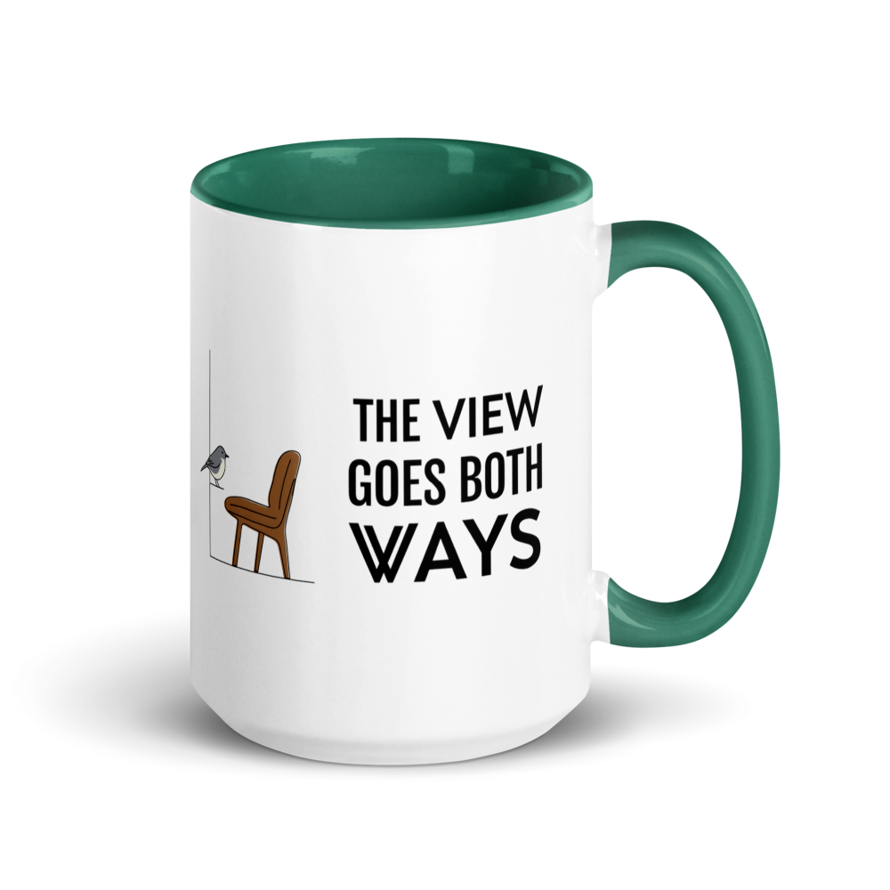 Bird watching mug with dark green inside, 15 oz, handle on the right: THE VIEW GOES BOTH WAYS beside a bird on the sill and an empty chair