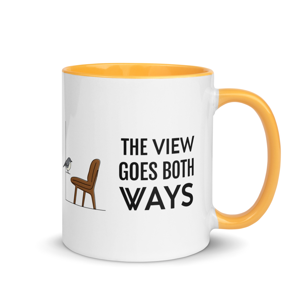 Bird watching mug with golden yellow inside, 11 oz, handle on the right: THE VIEW GOES BOTH WAYS beside a bird on the sill and an empty chair