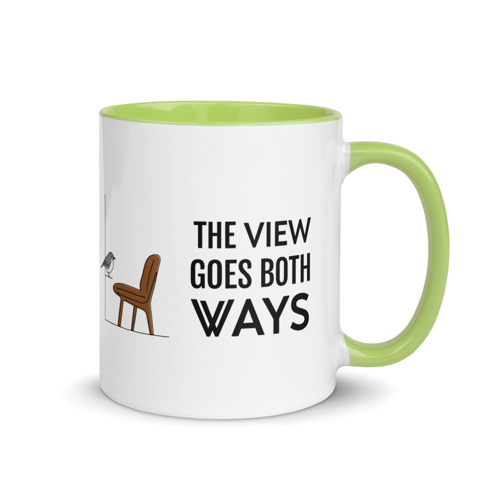 Bird watching mug with green inside, 11 oz, handle on the right: THE VIEW GOES BOTH WAYS beside a bird on the sill and an empty chair