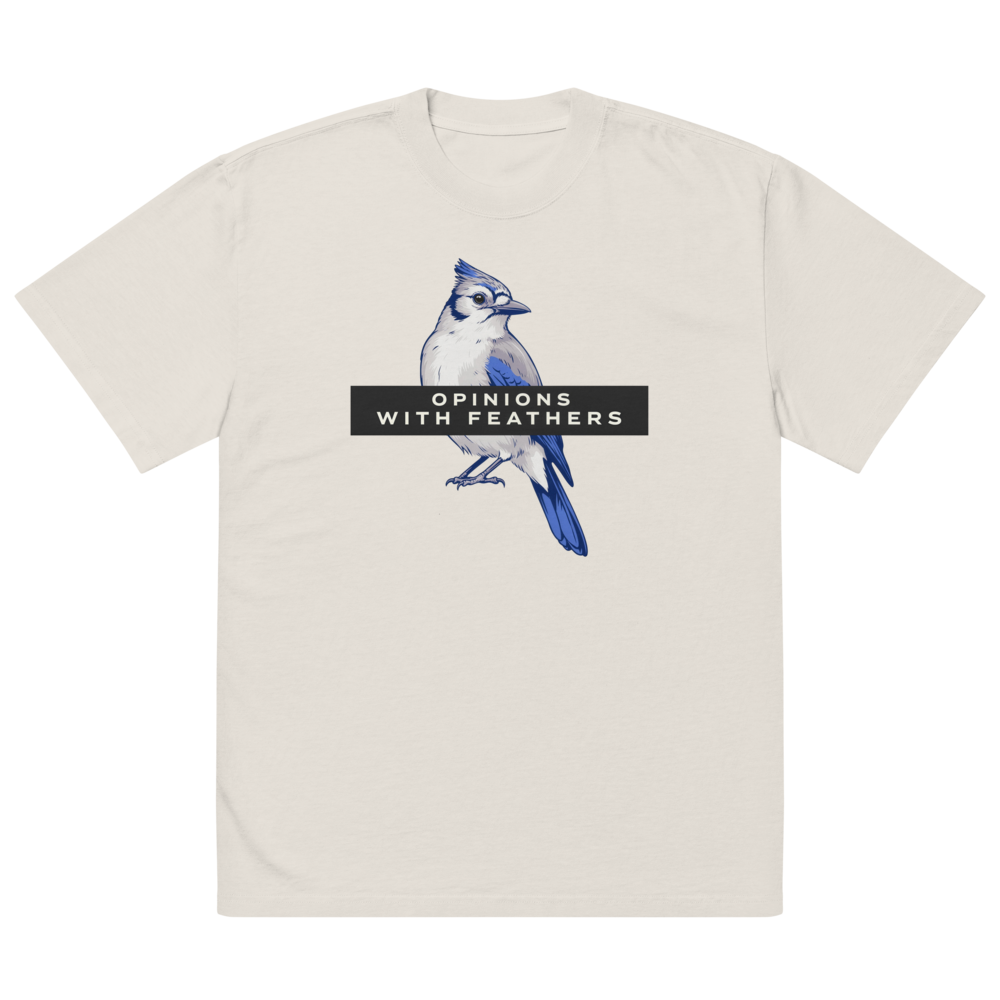The faded bone blue jay shirt laid flat, showing a blue jay under an OPINIONS WITH FEATHERS banner