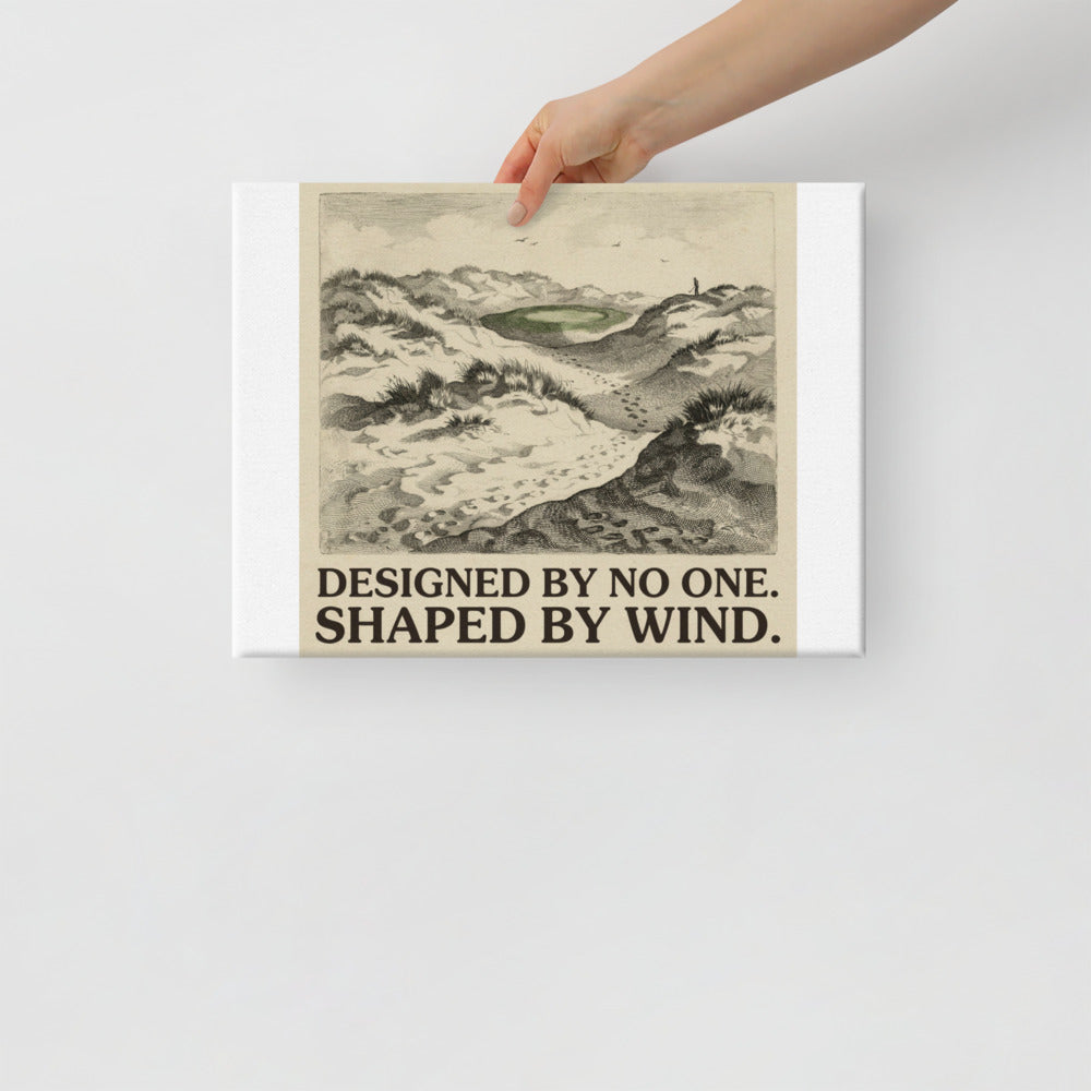 Shaped by Wind golf links canvas print hanging above a console table in a hallway, engraved dunescape with the caption Designed by No One Shaped by Wind