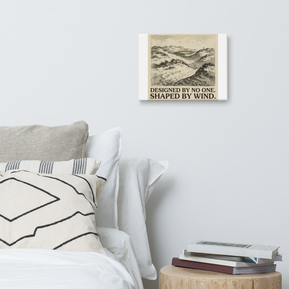 Shaped by Wind golf course architecture canvas in a living room setting, aged cream paper tone with letterpress caption band