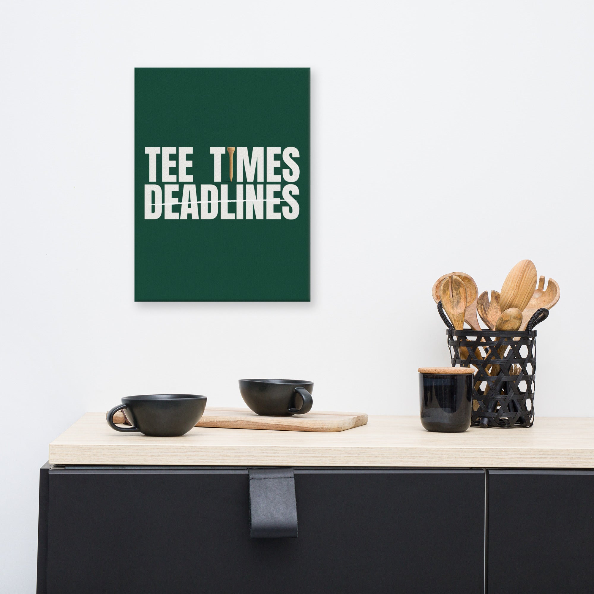 12″×16″ golf canvas print on a white wall above a sideboard: white capitals and a wooden tee on deep green