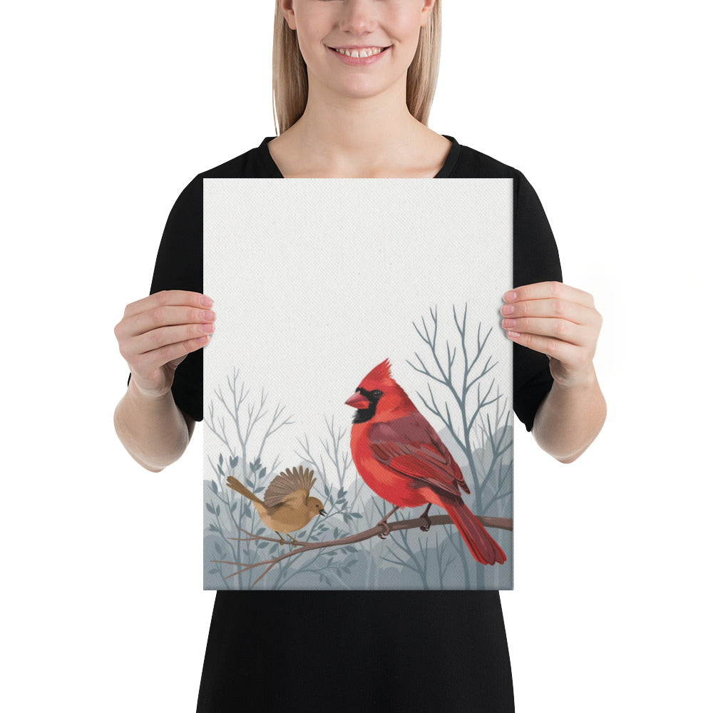 Person holding the 12x16 Life Against the Gray cardinal canvas to show its size