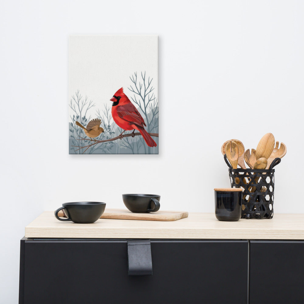 Life Against the Gray cardinal canvas above a kitchen sideboard with cups and utensils