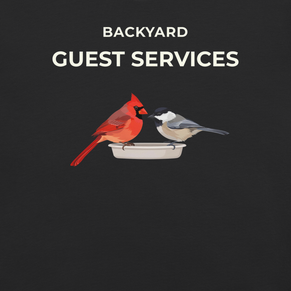 Detail of the Backyard Guest Services print on the black tee
