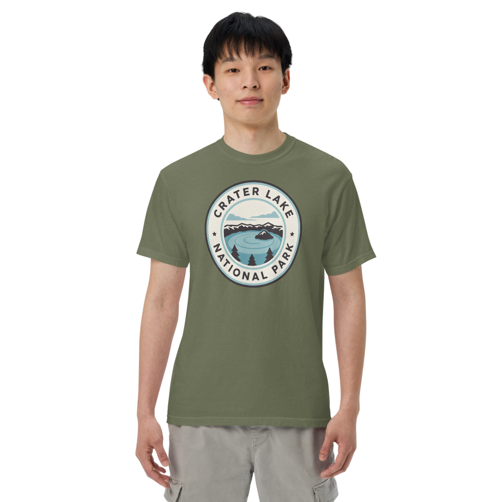 Crater Lake National Park vintage badge t-shirt in Moss worn by a model, front view