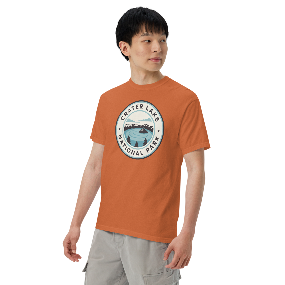 Crater Lake National Park vintage badge t-shirt in Yam worn by a model, side front view