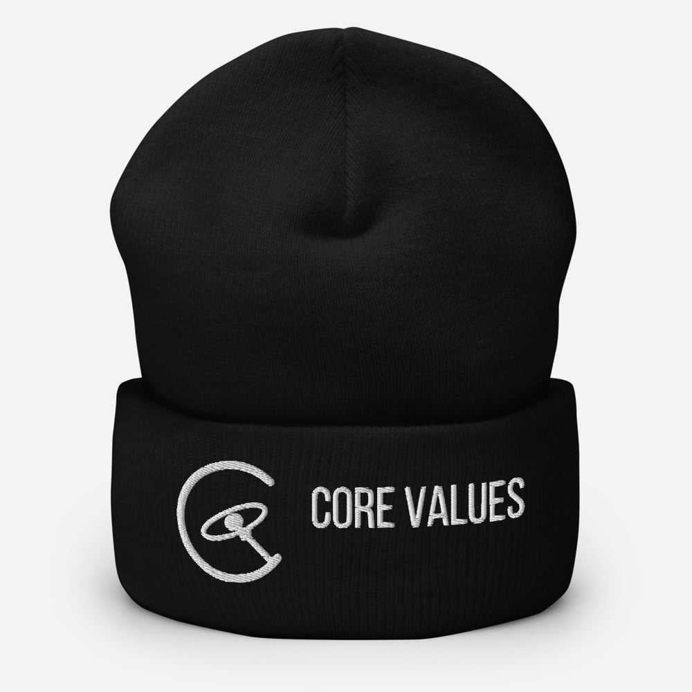Astronomy Beanie – Core Values in Black, close-up of the white embroidered galaxy-compass mark and CORE VALUES lettering on the cuff