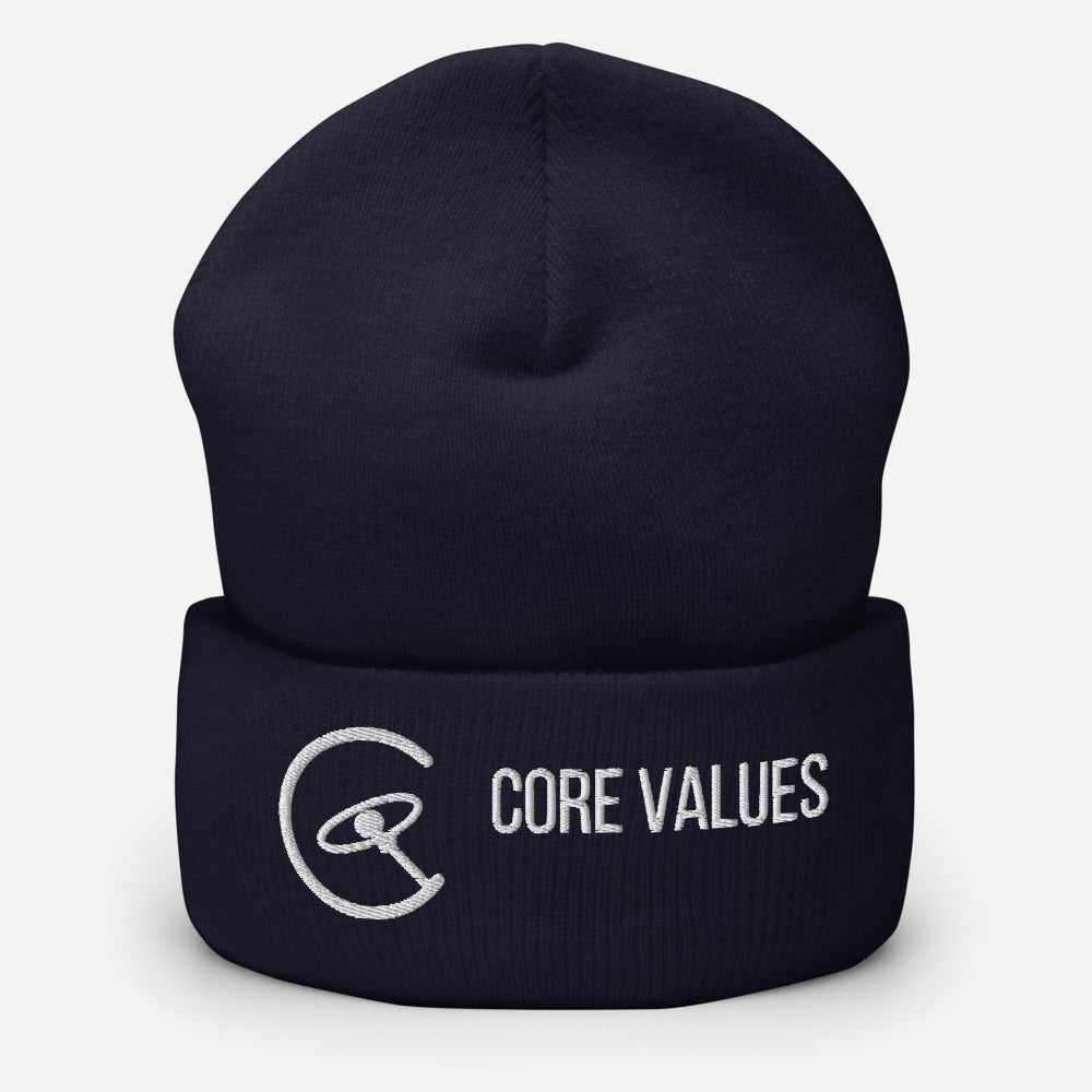 Astronomy Beanie – Core Values in Navy, close-up of the white embroidered galaxy-compass mark and CORE VALUES lettering on the cuff