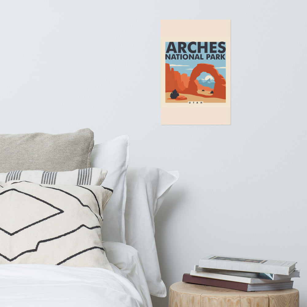 Arches National Park vintage poster hanging on the wall above a bed in a bright bedroom