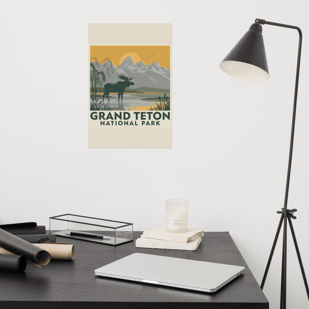 Grand Teton National Park vintage poster on the wall above a desk with a reading lamp