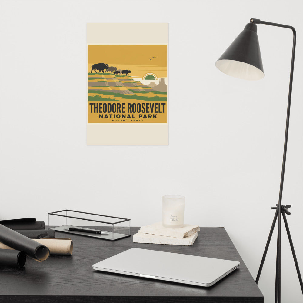 Theodore Roosevelt National Park vintage poster on the wall above a desk with a reading lamp