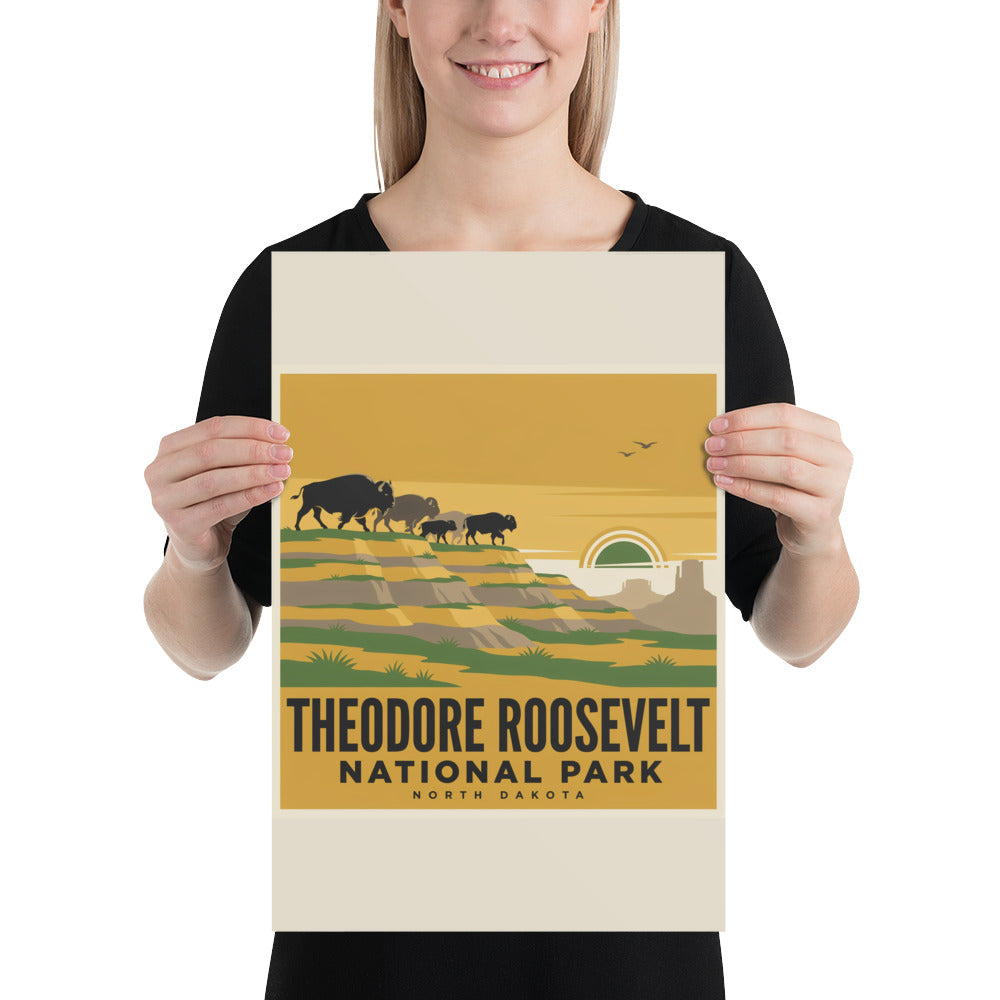Person holding the Theodore Roosevelt National Park vintage poster to show its scale