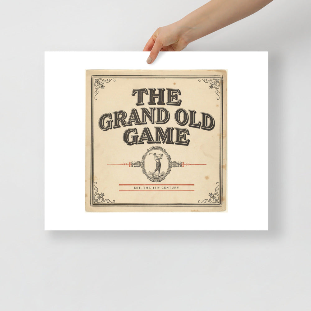 The Grand Old Game vintage golf poster styled above a console table in a living room
