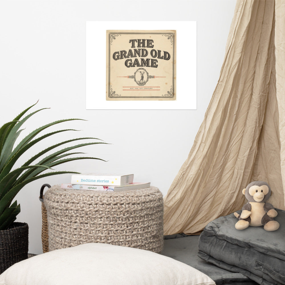 The Grand Old Game aged-cream woodtype golf poster on a wall in a warm interior setting