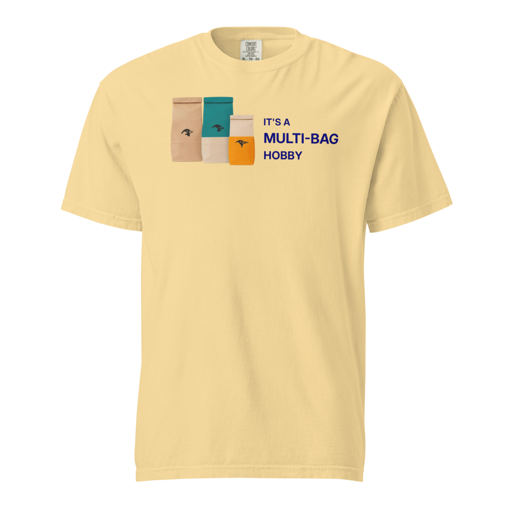 Funny Bird Shirt in Butter, front view: three seed bags beside IT'S A MULTI-BAG HOBBY