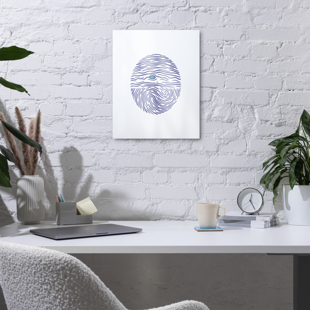 Jupiter fingerprint metal wall art above a white home-office desk with plants on a whitewashed brick wall