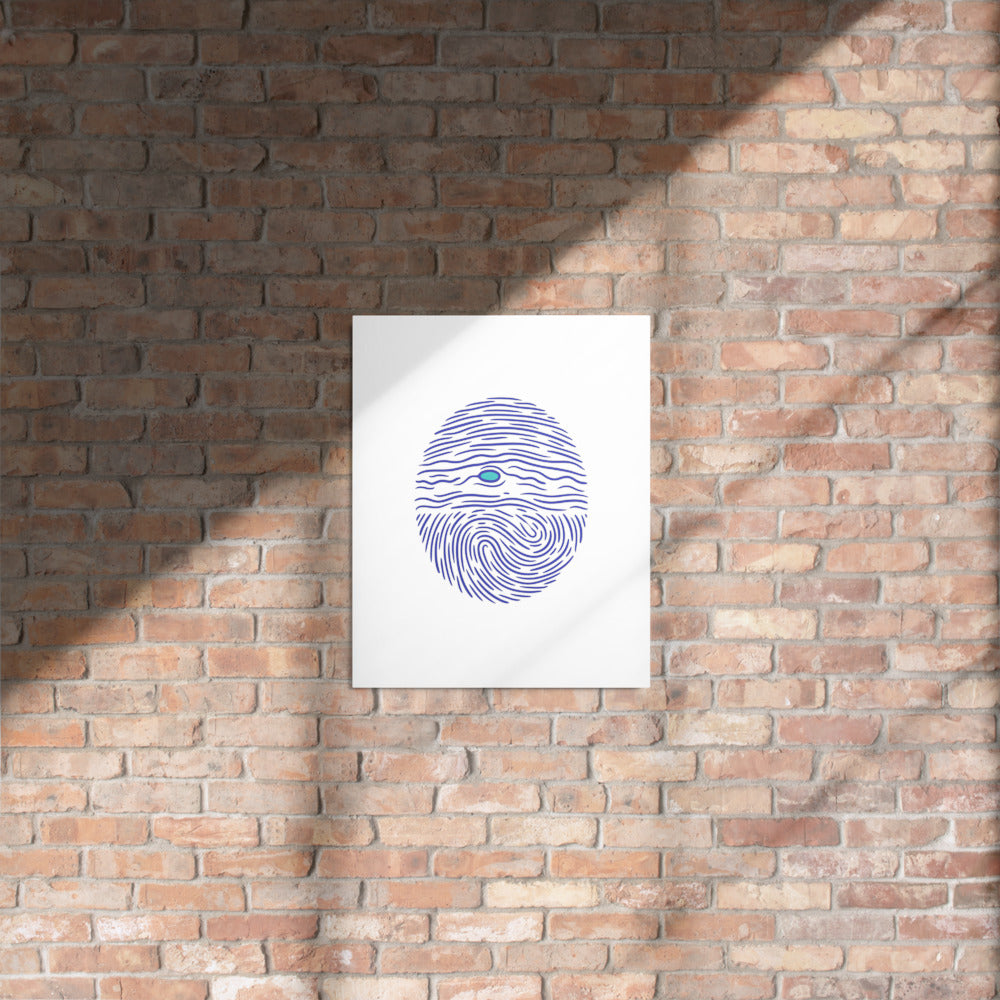 Jupiter fingerprint glossy metal print on a red brick wall in sunlight