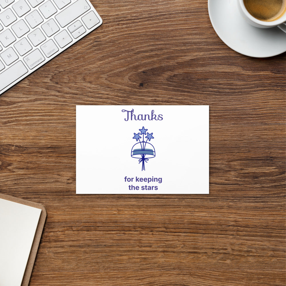 4x6 in Thanks for keeping the stars astronomy thank you card on a walnut desk with a coffee cup