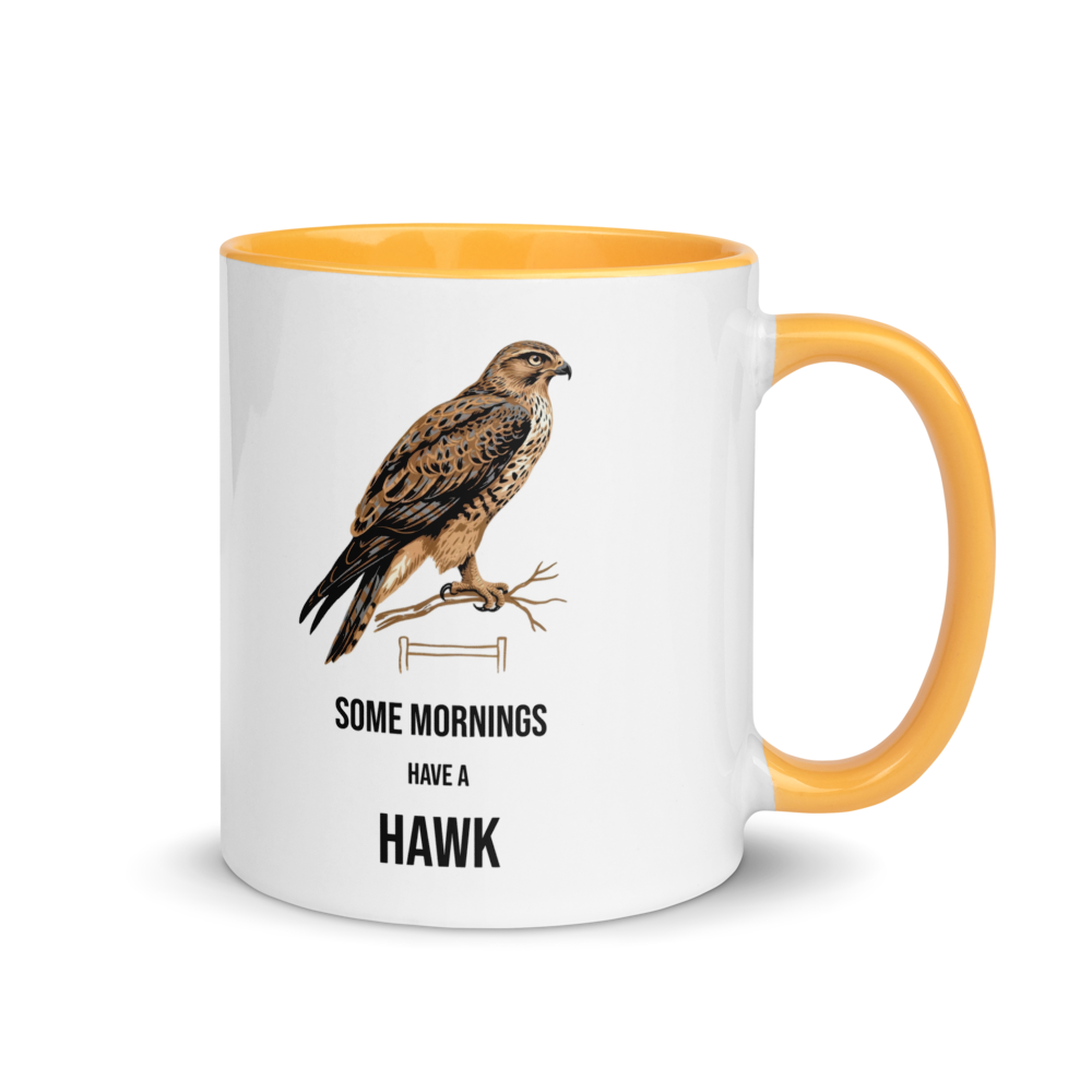 Hawk mug with golden yellow inside, 11 oz, handle on the right: a brown hawk on a branch over SOME MORNINGS HAVE A HAWK