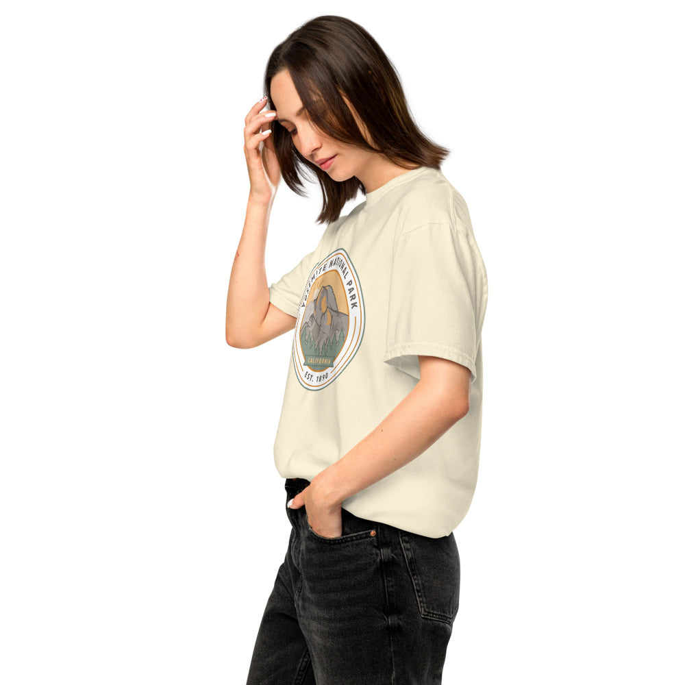 Yosemite National Park WPA-style badge t-shirt worn on model, ivory, side angle