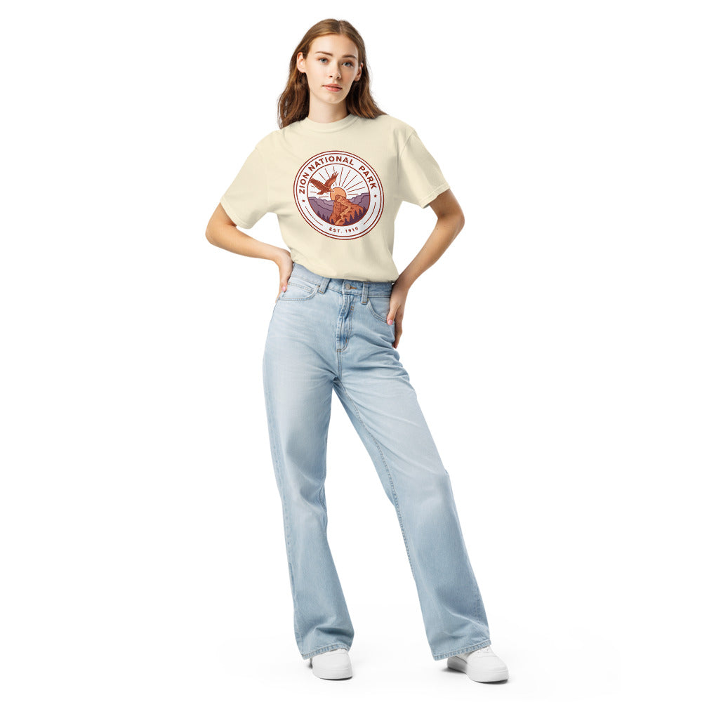 Zion National Park WPA-style badge t-shirt worn on model, ivory, front view