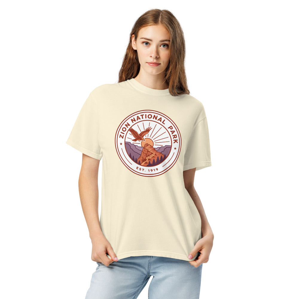 Zion National Park WPA-style badge t-shirt worn on model, ivory, alternate front angle