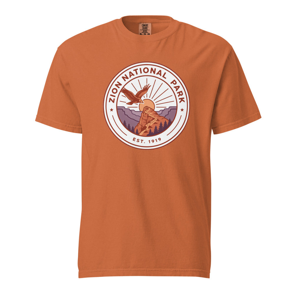 Zion National Park WPA-style badge t-shirt in yam orange, front flat view