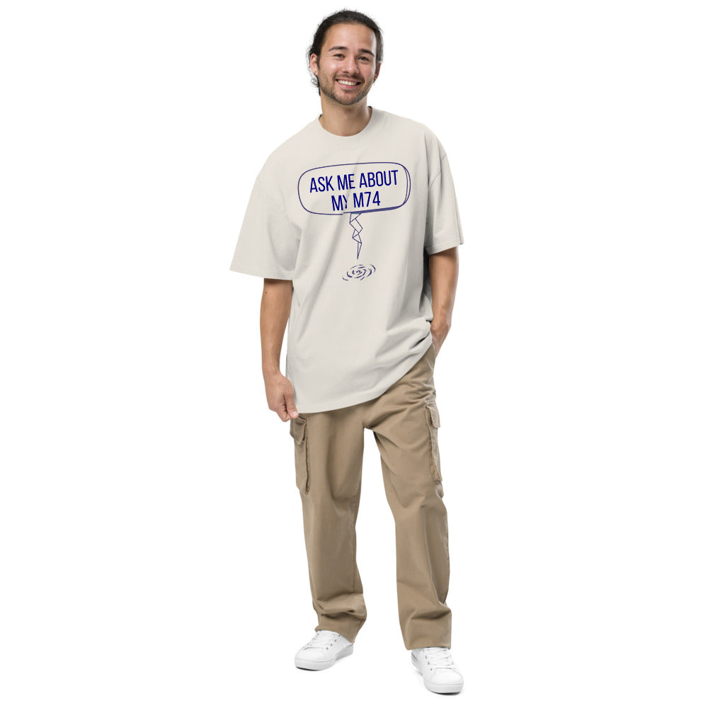 Smiling man wearing the Faded Bone Ask Me About My M74 oversized tee, full front view