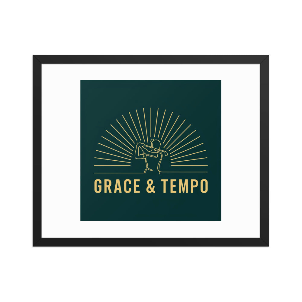The Swing Grace and Tempo framed golf print, flat front view of the gold single line woman golfer on deep emerald in a black frame