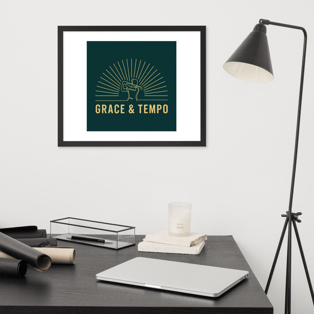 The Swing Grace and Tempo framed golf wall art hung above a desk, single line drawing of a woman golfer mid swing