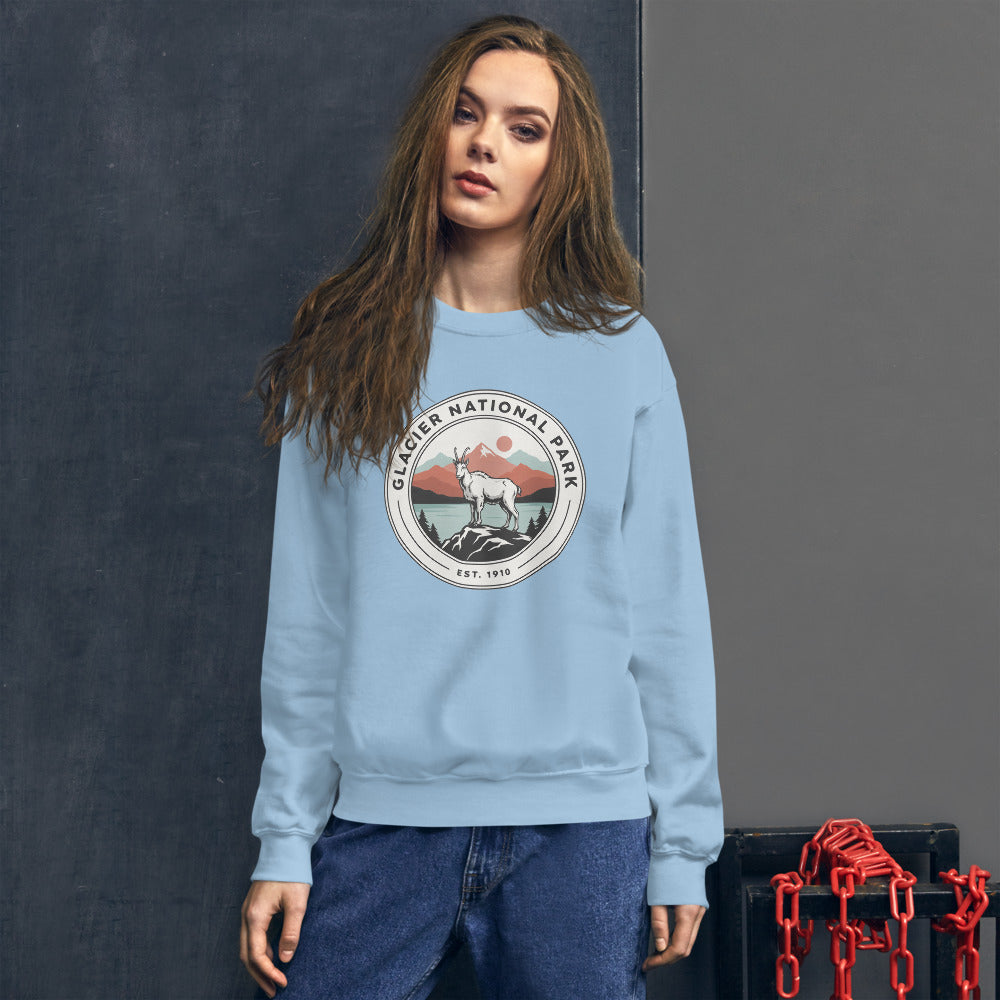 Glacier National Park badge crewneck sweatshirt in light blue, outdoor lifestyle shot