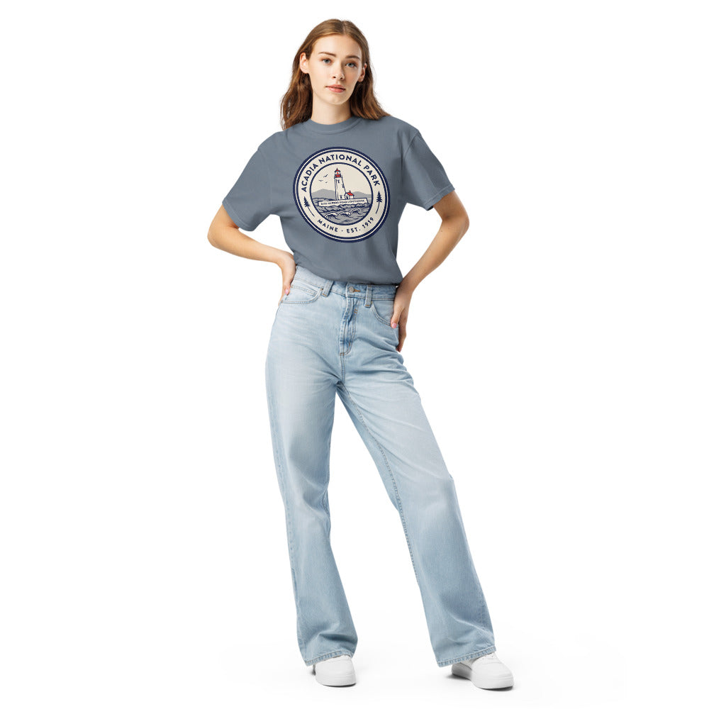 Acadia National Park vintage lighthouse badge t-shirt in blue jean worn by a model, front view