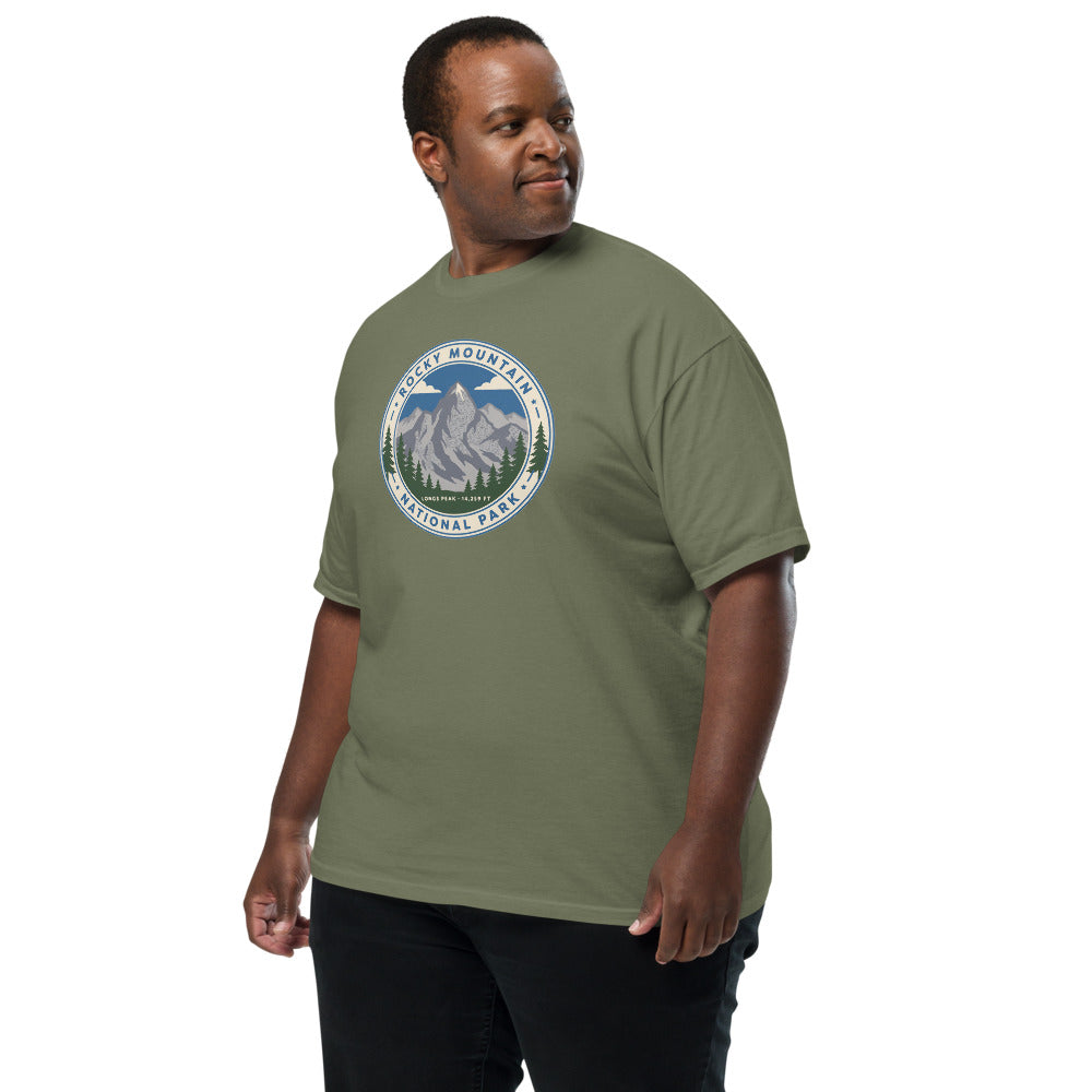 Rocky Mountain National Park vintage Longs Peak badge t-shirt in moss worn by a model, left-front angle