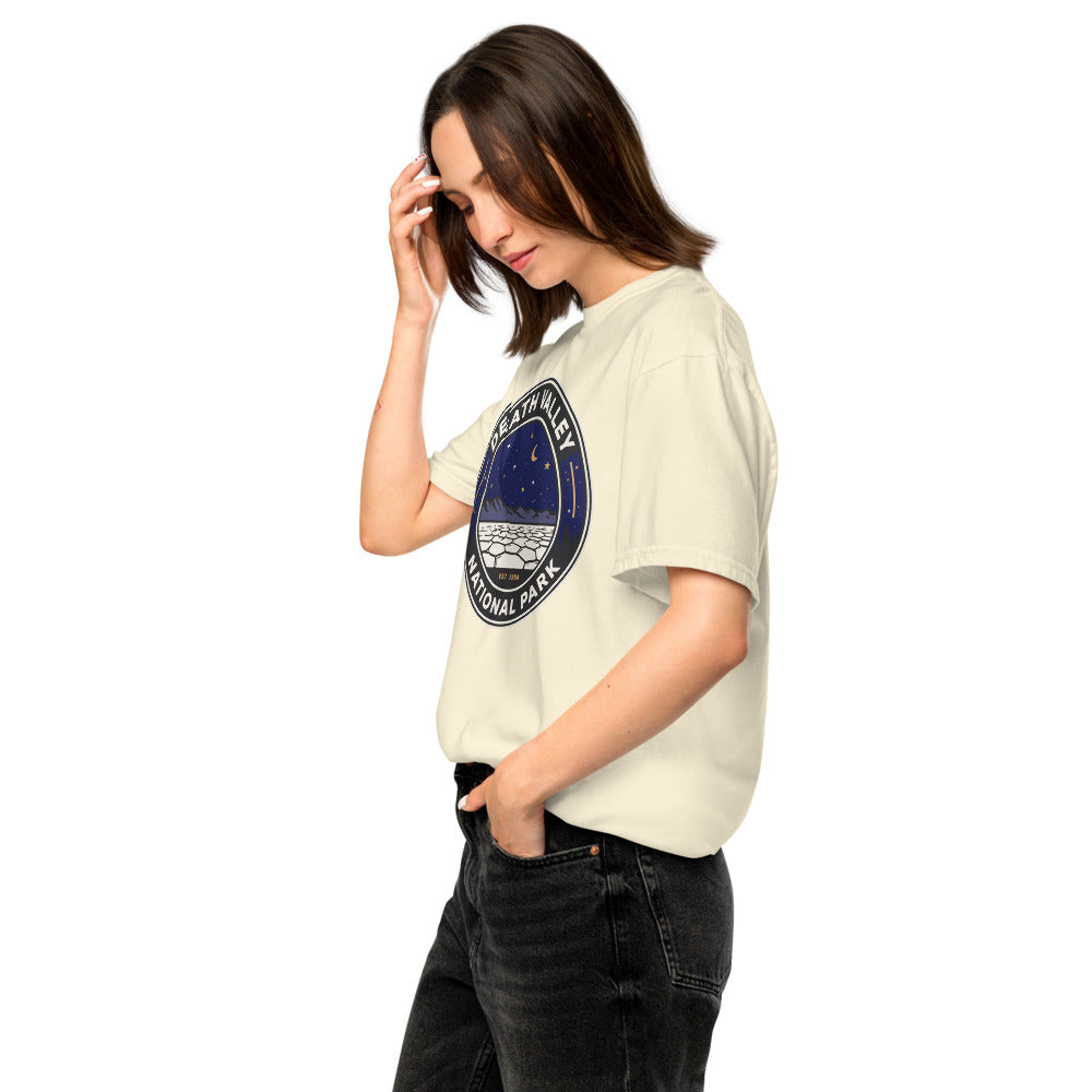 Death Valley National Park vintage night sky badge t-shirt in ivory worn by a model, left side view