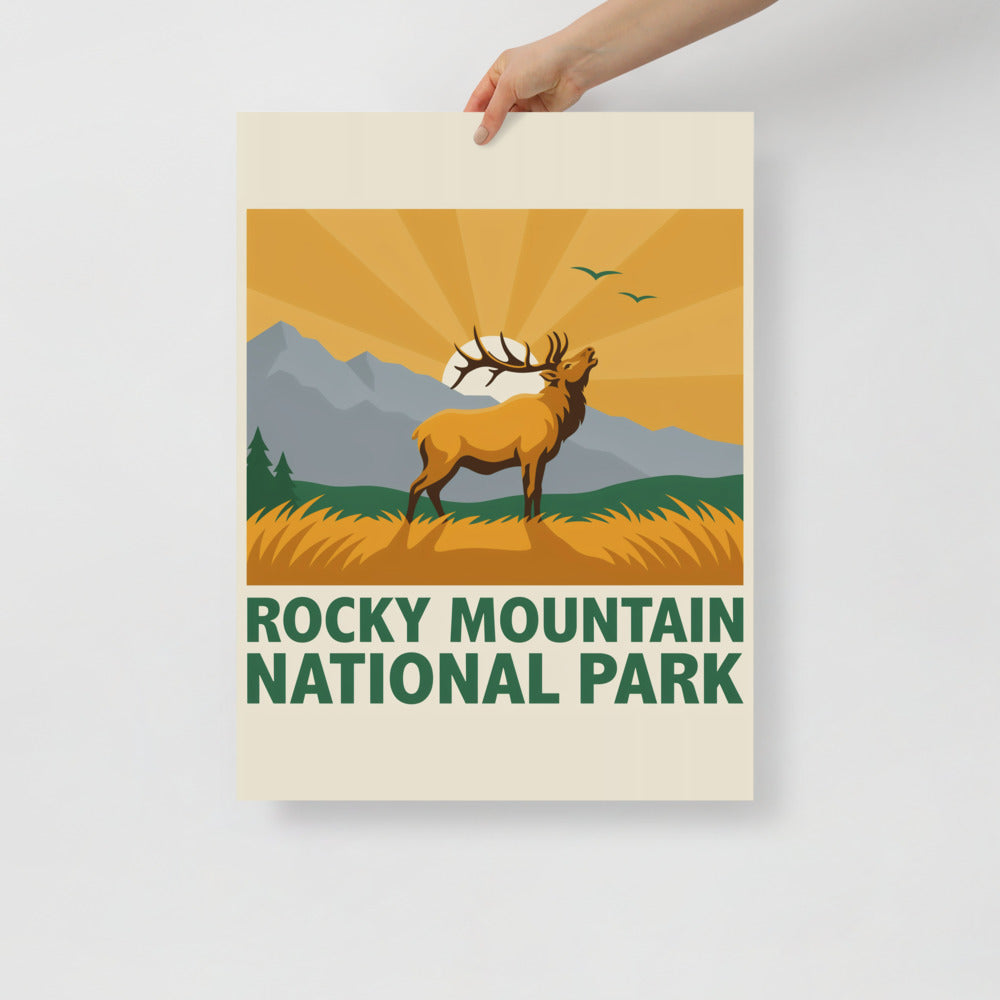 Hand holding the Rocky Mountain National Park vintage poster against a plain wall
