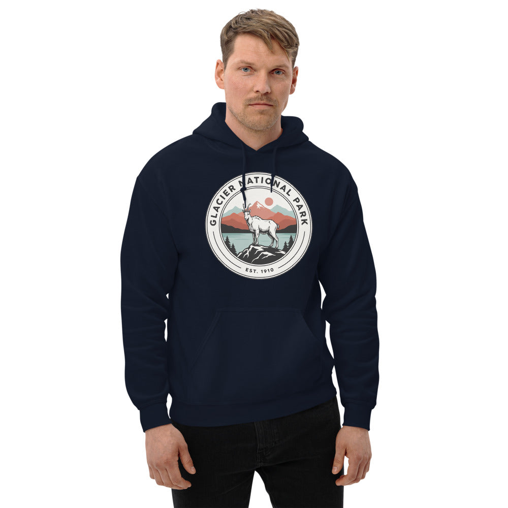 Glacier National Park vintage mountain goat badge hoodie in navy worn by a man, front view