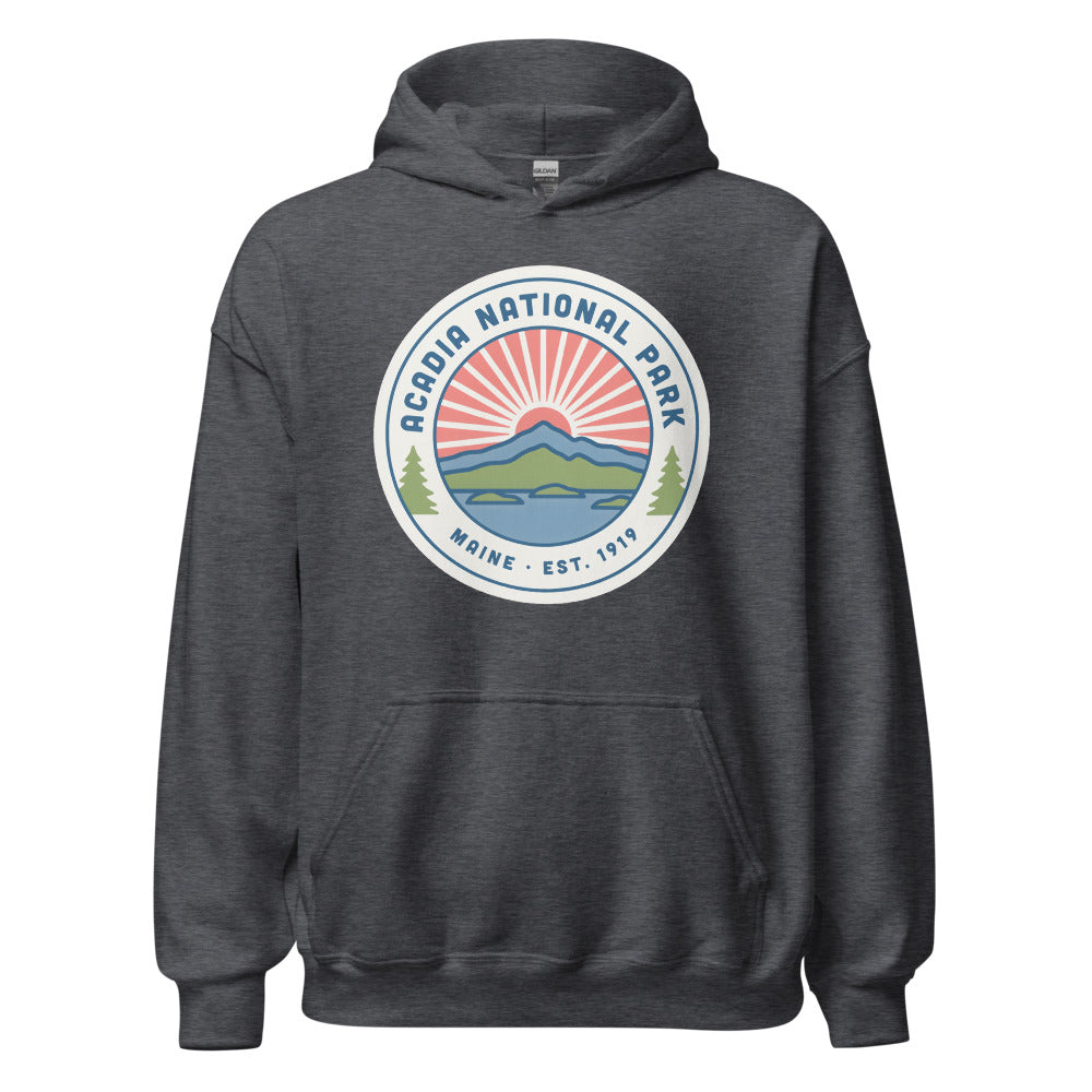 Acadia National Park vintage coastal sunrise badge hoodie in dark heather grey, front view of the heavyweight pullover