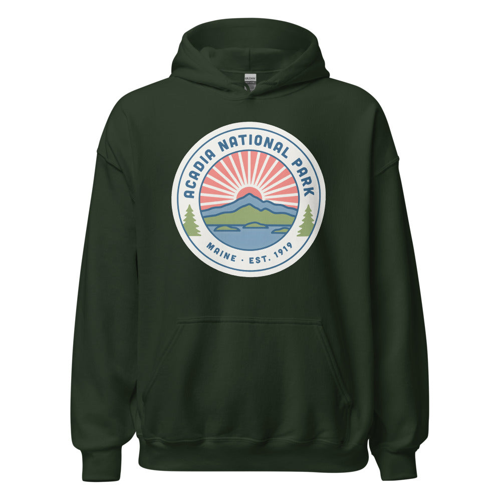 Acadia National Park vintage coastal sunrise badge hoodie in forest green, front view of the heavyweight pullover