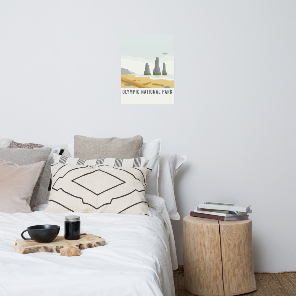 Olympic National Park vintage poster hanging above a bed in a neutral bedroom