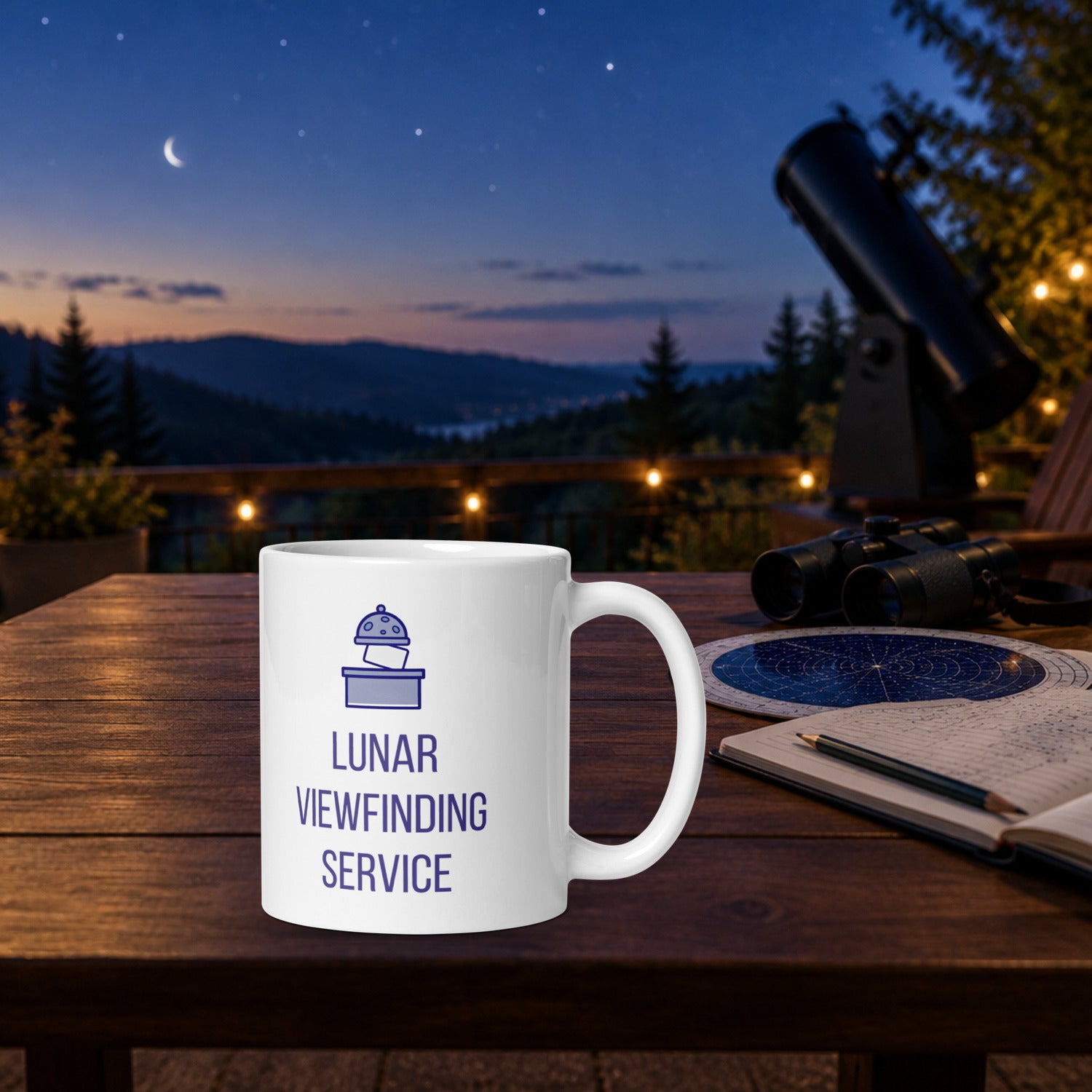 Lunar Viewfinding Service mug on an outdoor table at blue hour, crescent moon overhead, with binoculars, a planisphere and an observing logbook