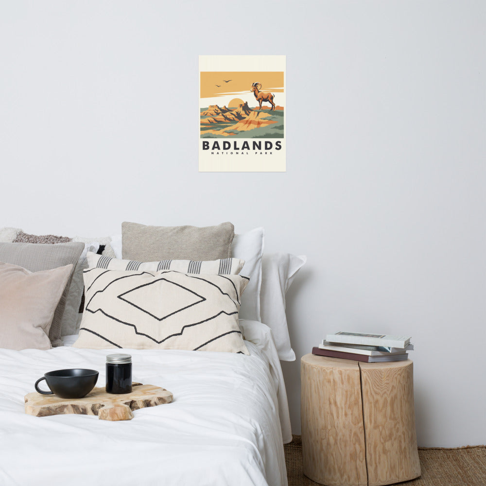 Badlands National Park vintage travel poster with a bighorn ram above eroded rock spires, hanging above a bed in a styled bedroom